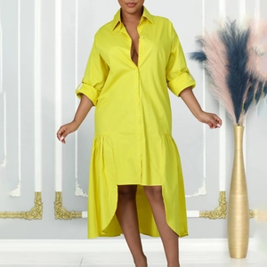 Detail of bright yellow shirt dress showing lapel collar and front button placket
