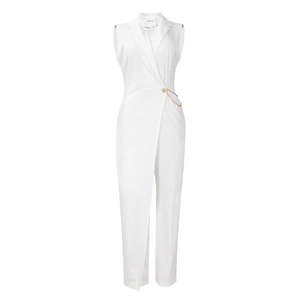 Detail of white sleeveless jumpsuit featuring a chic lapel collar and gold chain buckle