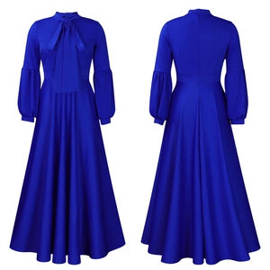 Detail of royal blue maxi dress featuring lantern sleeves and elegant front tie neckline