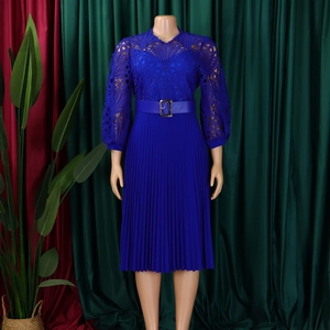 Detail of royal blue lace crochet bodice and pleated skirt with elegant belted waist