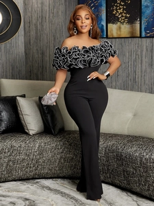 Elegant off-the-shoulder black jumpsuit with ruffle trim and high waist design for women