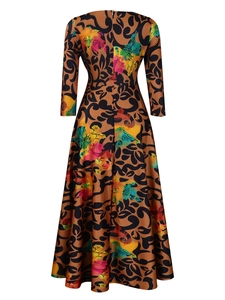 Back view of elegant camel A-line maxi dress with floral print and hidden back zipper