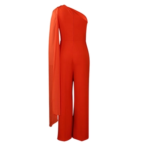One-shoulder orange-red jumpsuit with elegant long chiffon drape and wide-leg trousers