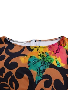 Detail of floral printed dress neckline featuring invisible zipper and brand logo label