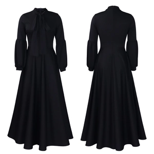 Detail view of black vintage maxi dress with lantern sleeves and high waist design