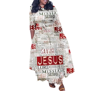 Detail of the asymmetric hemline and religious text print on this long sleeve dress
