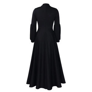 Rear view of black high waist maxi dress with lantern sleeves and a full A-line skirt