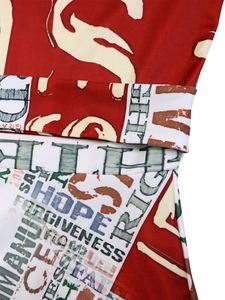 Detail of waist tie on plus size dress with Hope and Faith text print patterns