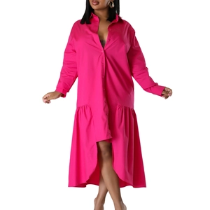 Close-up of fuchsia high-low hem dress with ruffled edges and sleek fabric texture