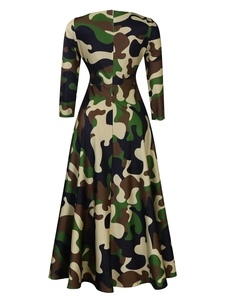 Rear view of long sleeve camouflage print maxi dress featuring tie-waist and flared hem