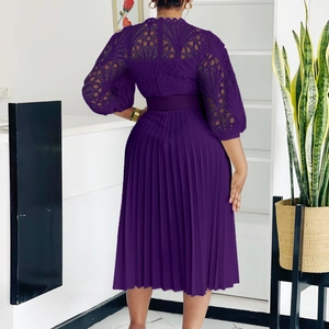 Detail view of purple lace hollow dress back with pleated skirt and matching belt