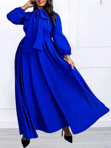 Elegant royal blue maxi dress with lantern sleeves and a bow tie high waist design