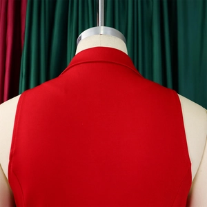 Detail of red blazer back collar and shoulder stitching on professional mannequin