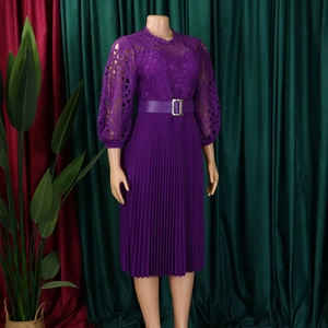 Detail of purple lace hollow bodice and pleated skirt with matching buckled waist belt
