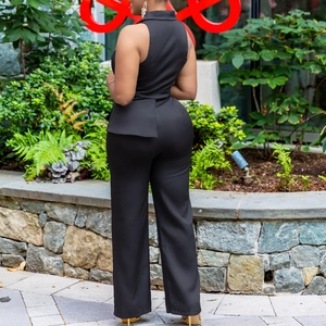 Rear view of black sleeveless suit jumper with unique asymmetrical peplum design