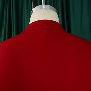 Detailed back view of red flared sleeve top showing professional stitching on soft fabric