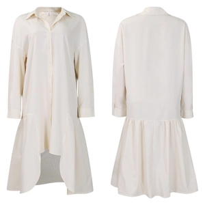 Detail of loose-fit shirt dress with button closure and high-low ruffled hemline