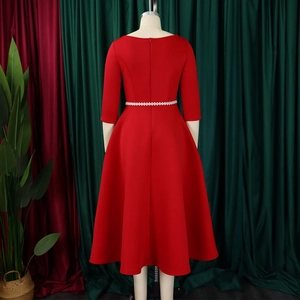 Back view of red A-line evening dress with elegant pearl belt and three-quarter sleeves