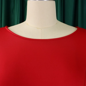 Close-up of crew neckline and fine stitching detail on red knit evening dress