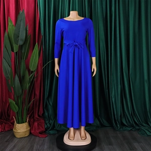 Detail view of royal blue A-line maxi dress with waist tie and round neck long sleeves