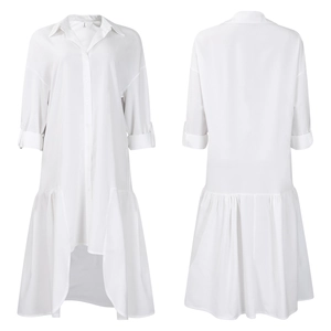 Detail of white shirt dress featuring asymmetrical hem and roll-up sleeves with buttons