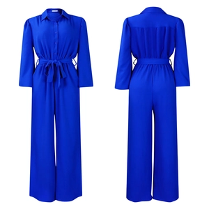 Front and back views of royal blue long sleeve wide-leg jumpsuit with drawstring waist
