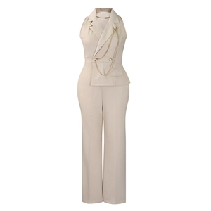 Detail of beige sleeveless jumpsuit featuring lapel collar and gold chain waist decor