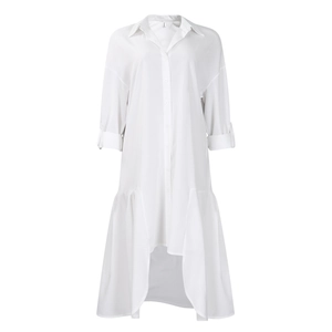 Detail showing the white shirt dress asymmetric hem with ruffles and breathable fabric