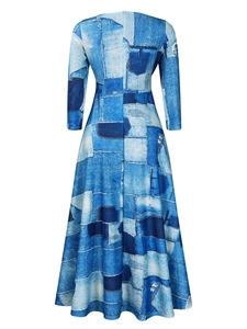 Detail of A-line floral dress back view with denim patchwork print and invisible zipper