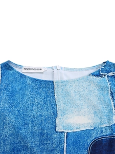 Detail of neckline with hidden zipper and floral print on woven fabric texture