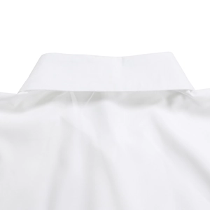 Detailed macro view of a crisp white dress shirt collar with high-quality stitching