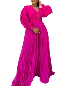 Elegante tuta a pieghe rosa fucsia con maniche a lanterna e dettagli in vita con paillettes