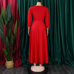 Back view of elegant solid red long sleeve maxi dress with flowing A-line skirt detail