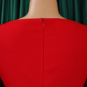 Close-up of the red dress back collar showing the high-quality invisible zipper detail