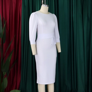 Detail of round neck and puff long sleeves on a white slim fit sheath midi dress