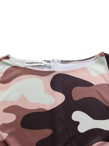 Close-up of the elegant round neckline with camo floral print and back zipper detail