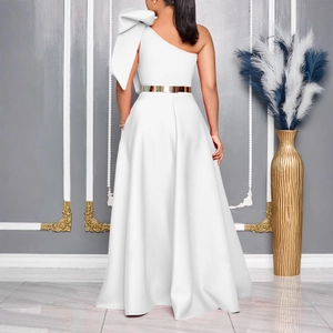 Back view of elegant white one-shoulder evening gown with large bow and gold waist belt