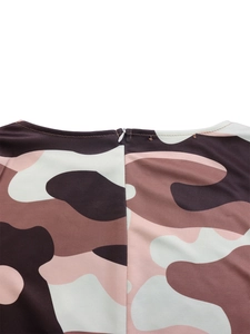 Detail of camouflaged pattern dress featuring a concealed back zipper closure