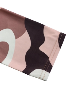 Close-up of elegant floral print fabric and high-quality double-stitch hem detail