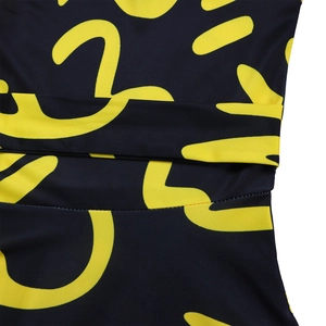Detail of high-elasticity fabric with African print and fine flatlock stitching seams