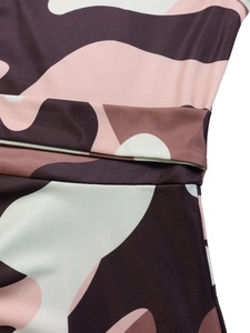 Detailed close-up of the elegant camo print fabric with precise stitching on dress