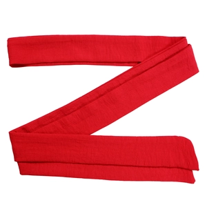 Detailed view of the red long fabric belt with a soft knitted texture for the jumpsuit