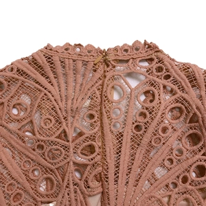 Detail of high collar lace dress with floral hollow pattern and back invisible zipper