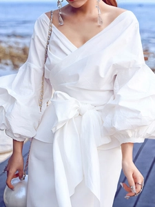 Elegant white V-neck puff sleeve blouse with waist bow tie and off-shoulder design