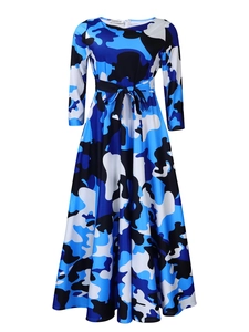 Detail of the tie-waist and camouflage print on the blue and black flared midi dress