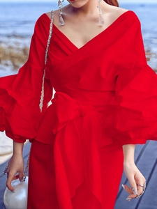 Elegant red off-the-shoulder puff sleeve shirt with waist tie bow and V-neckline