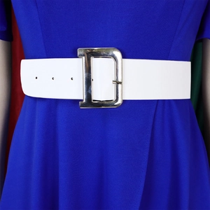 Close-up of white wide leather belt with large silver D-ring buckle on blue dress