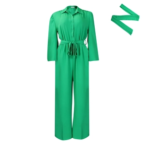 Detail of lime green long sleeve jumpsuit with waist drawstring and wide leg cut
