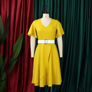 Detail view of bright yellow V-neck dress with ruffle sleeves and white waist belt