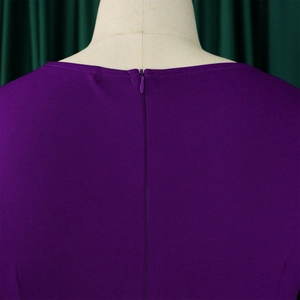 Detail of dark purple dress neckline featuring seamless invisible zipper on thick fabric